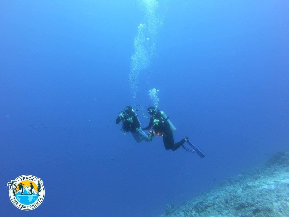 Learning from the Dive Master at Rangiroa Diving Center