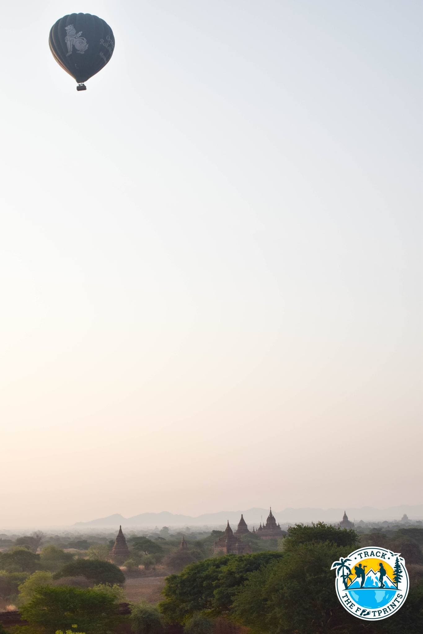 Temples & Landscapes of Bagan during sunrise with ballons
