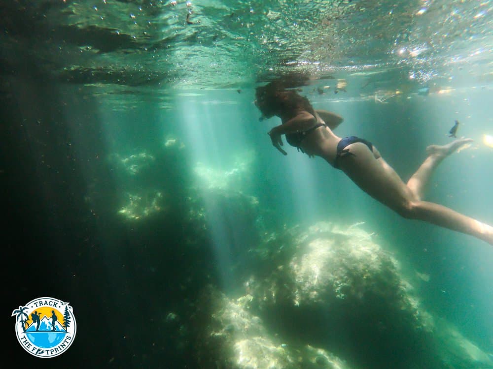 Snorkeling in a cave of the Passage (not far from Warikaf Homestay)