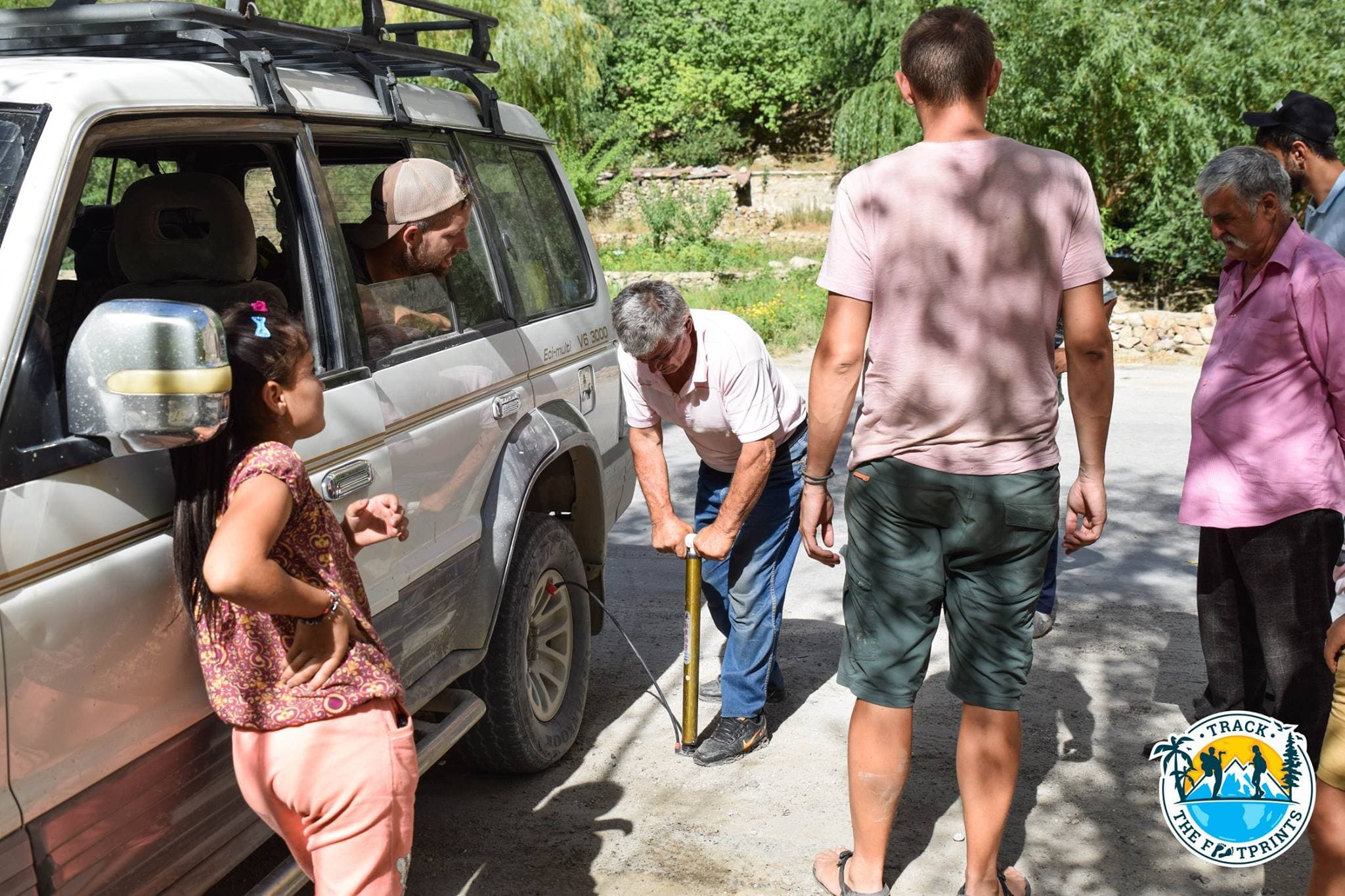 One nice guy helped us with our tire... And we took his wife in our car for a few kms then.
