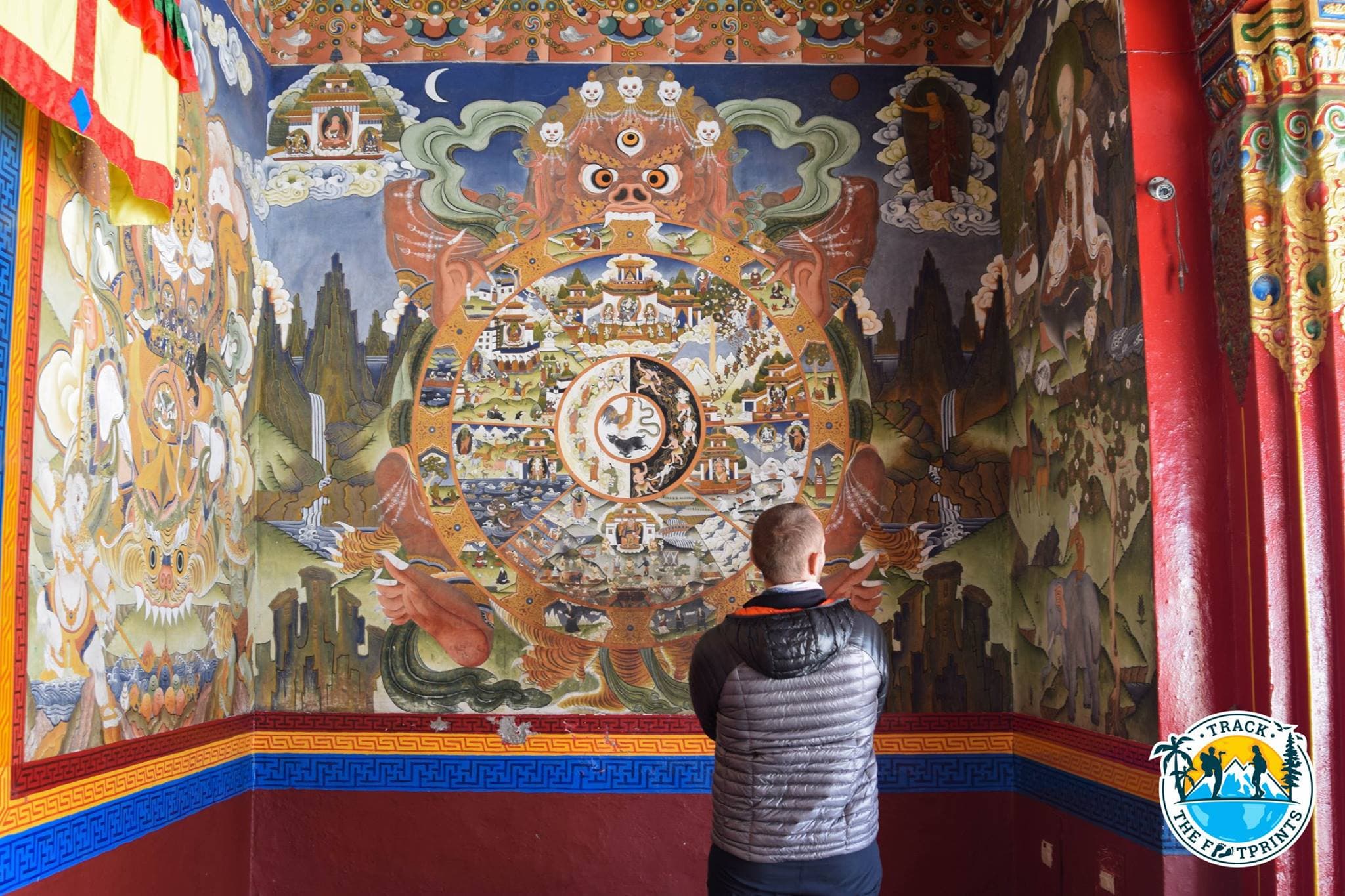 William enjoying symbolic paintings in Tawang Monastery