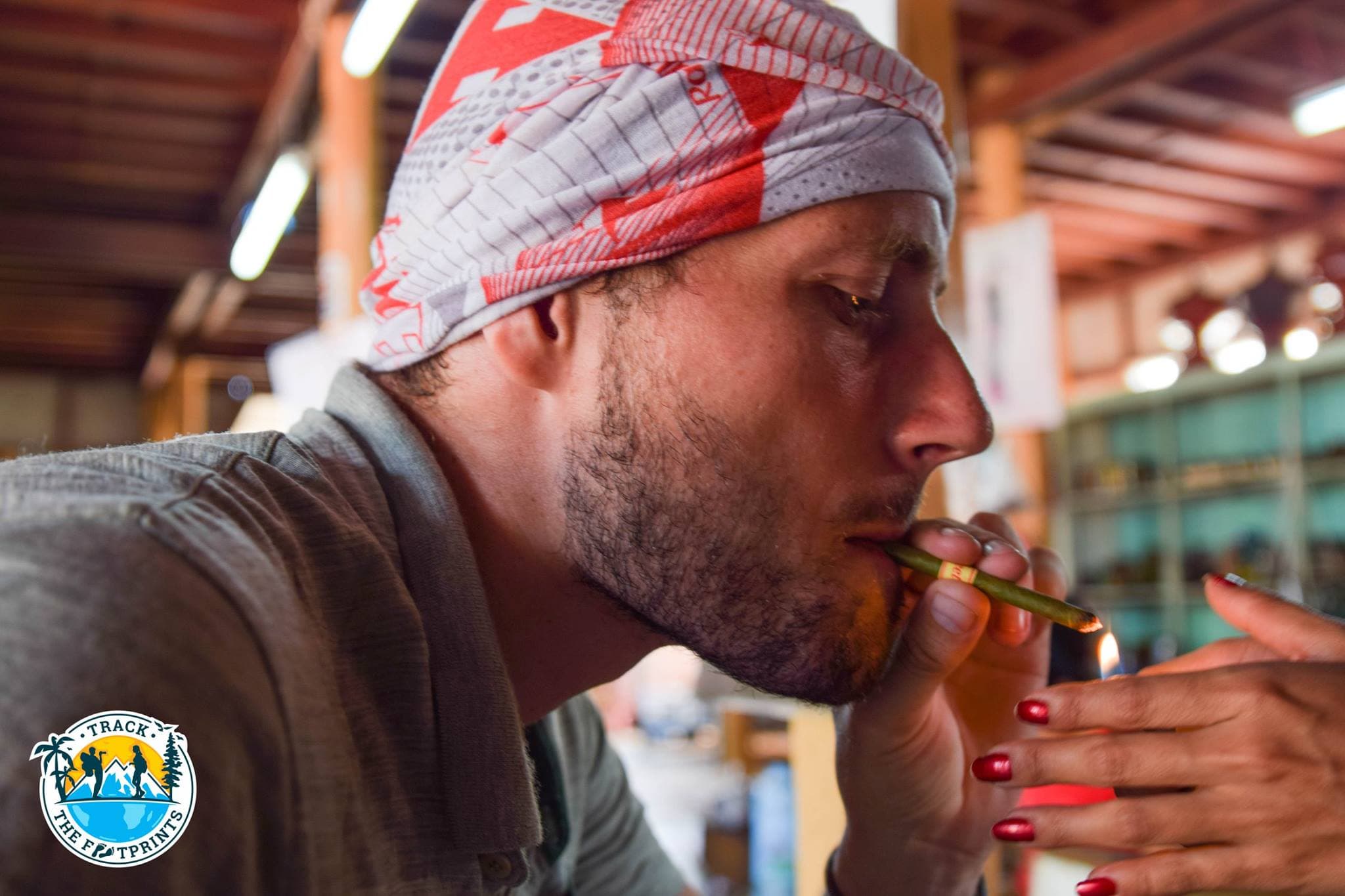 William trying some local tobacco
